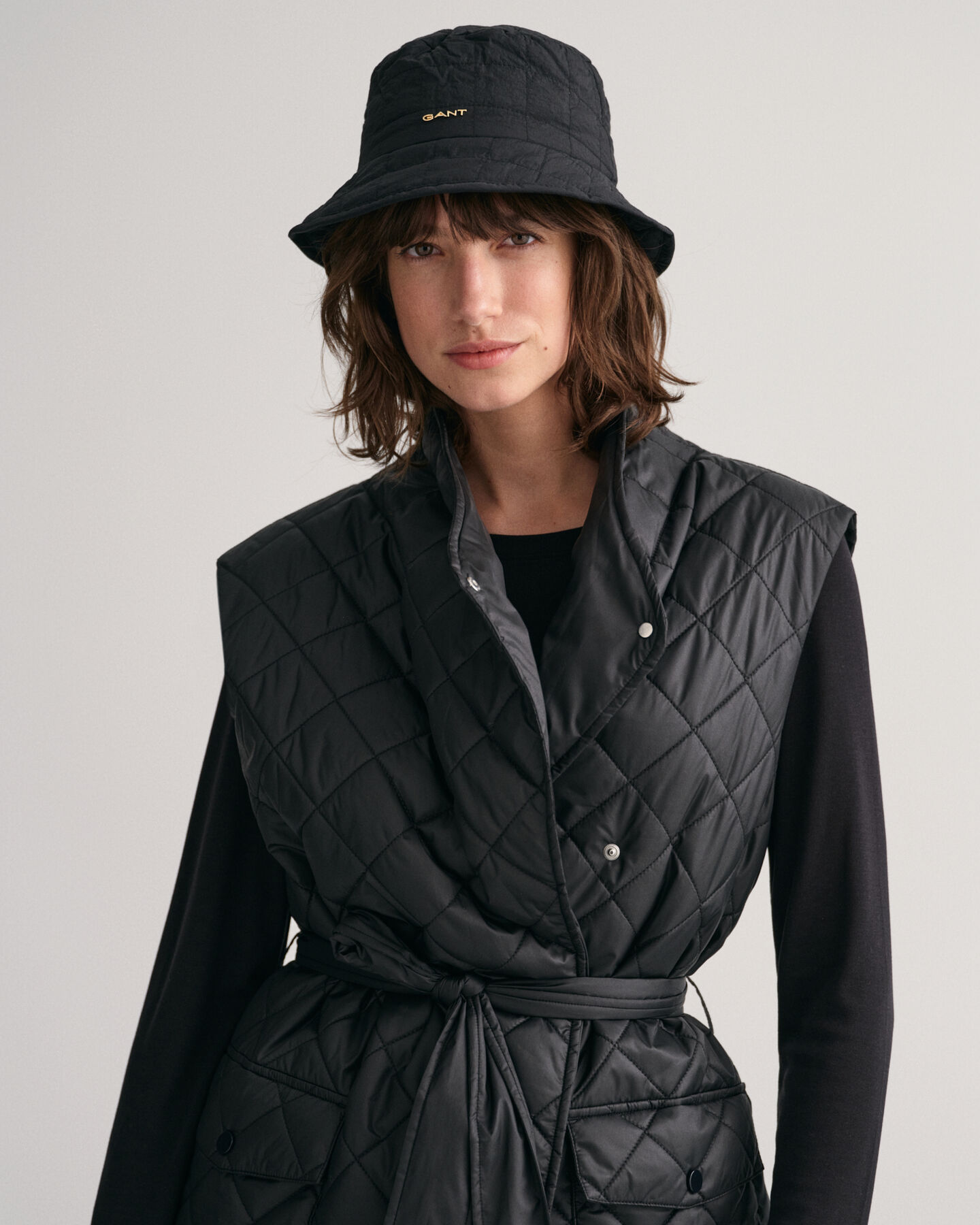 Pitk&auml; tikkiliivi