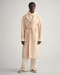 Käsin tikattu takki vyöllä