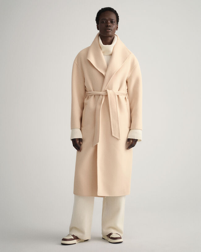 Käsin tikattu takki vyöllä