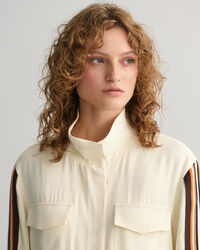 Relaxed fit ‑mitoitettu raidallinen takki