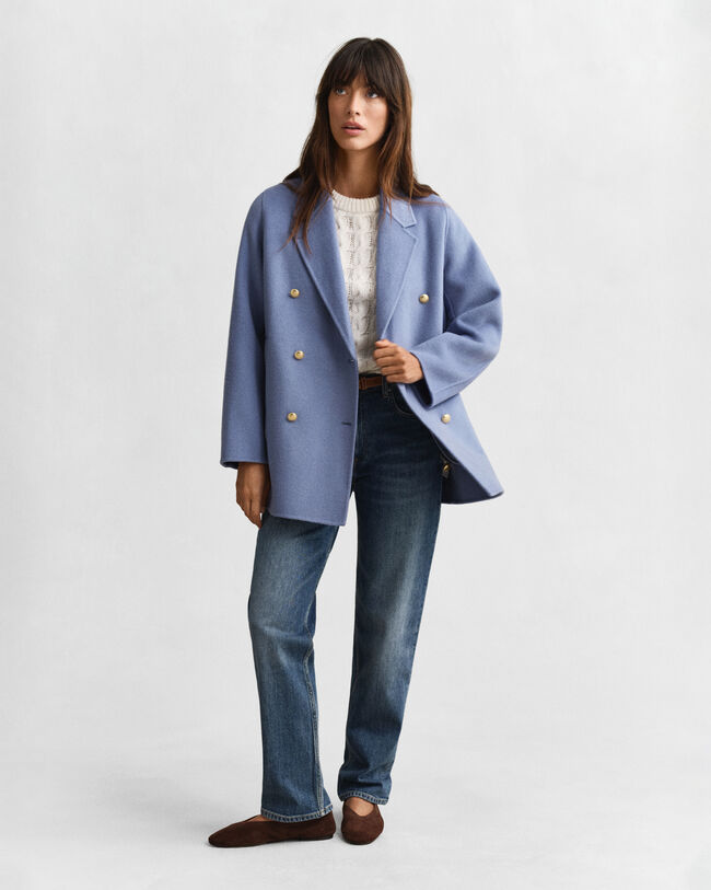 Käsin tikattu kansitakki