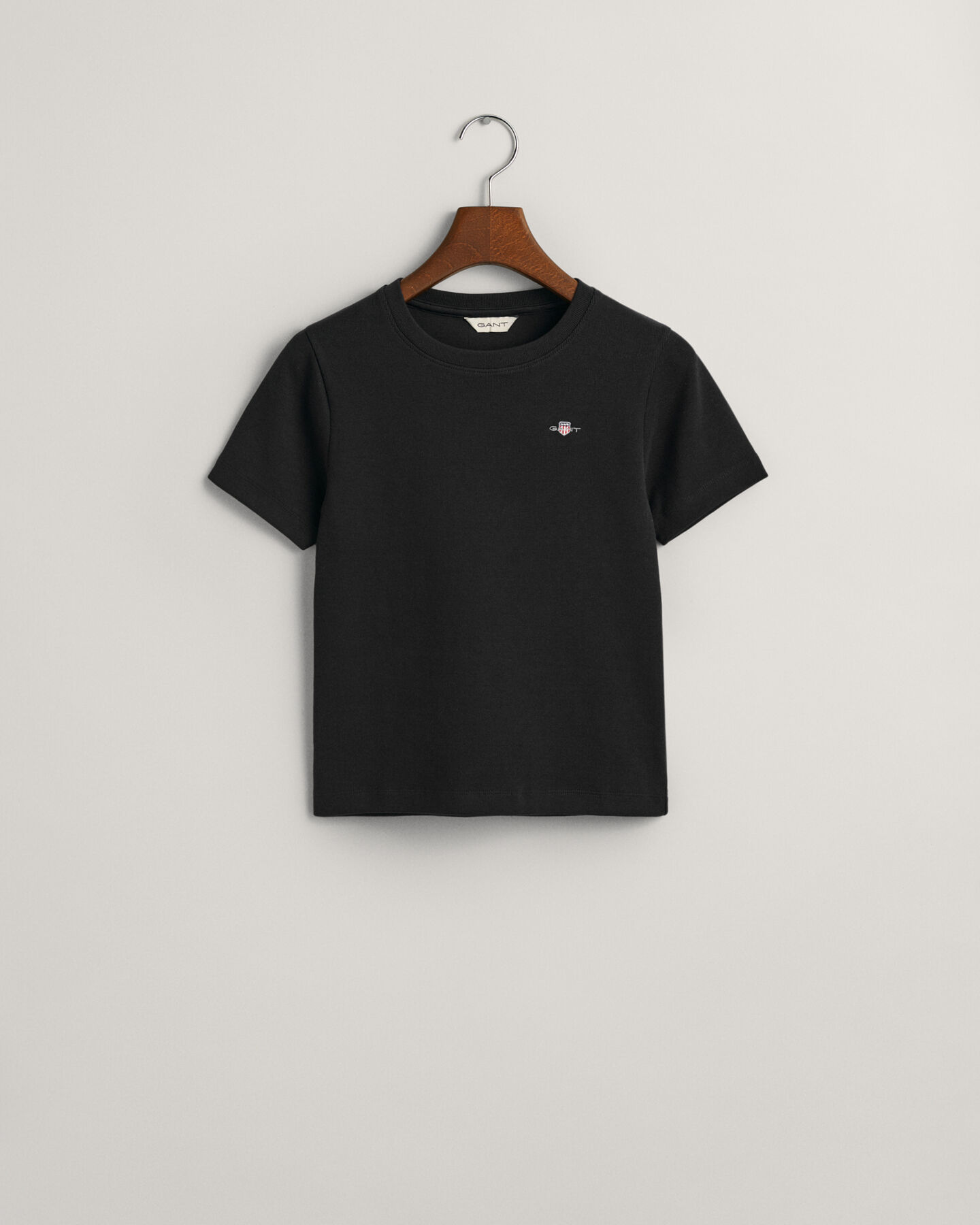 Teen Girls ‑malliston ribbineulottu Shield‑t‑paita