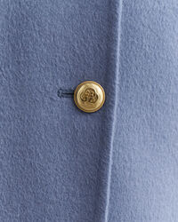 Käsin tikattu kansitakki