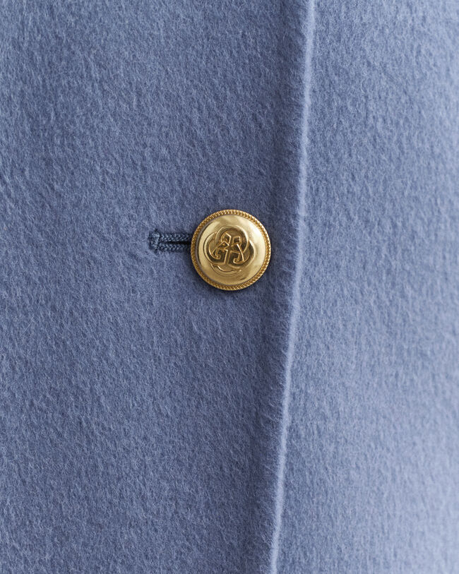 Käsin tikattu kansitakki