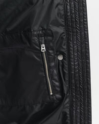 Relaxed fit ‑mitoitettu untuvatakki