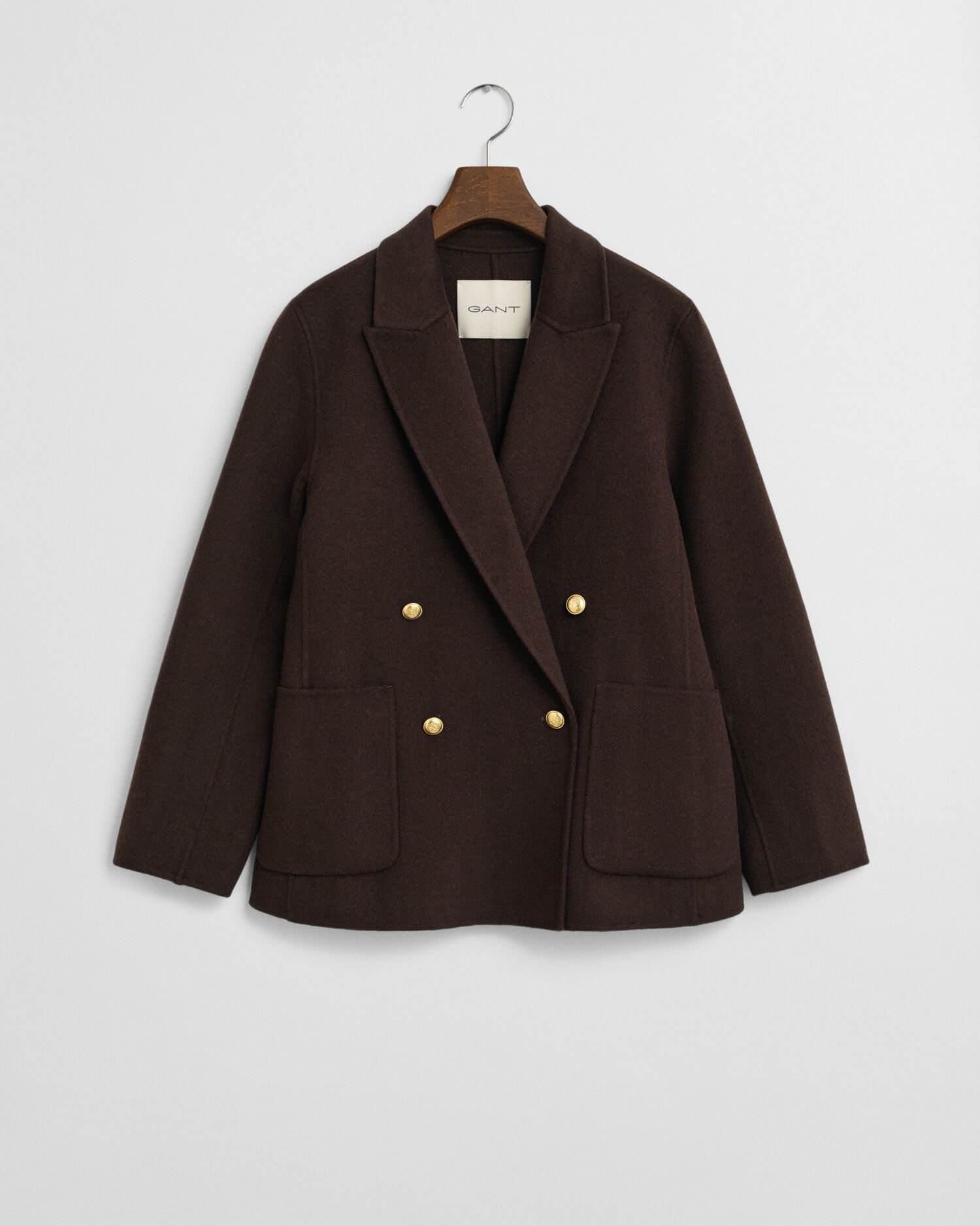 Käsin tikattu klubitakki