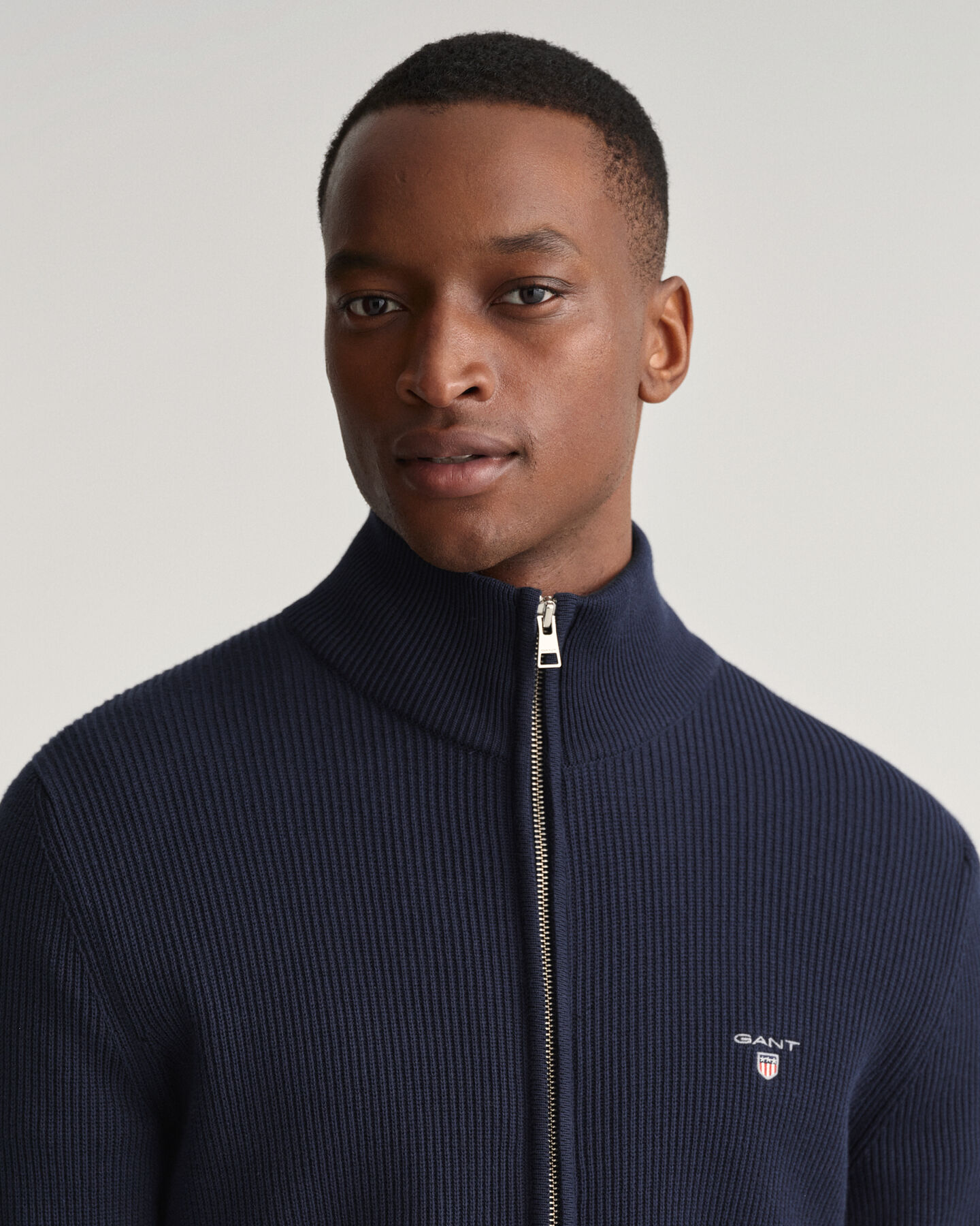 Texture-joustinneuletakki vetoketjulla