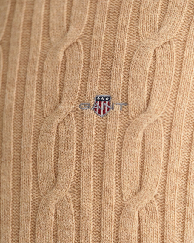 Lampaanvillainen palmikkoneule, jossa pyöreä pääntie