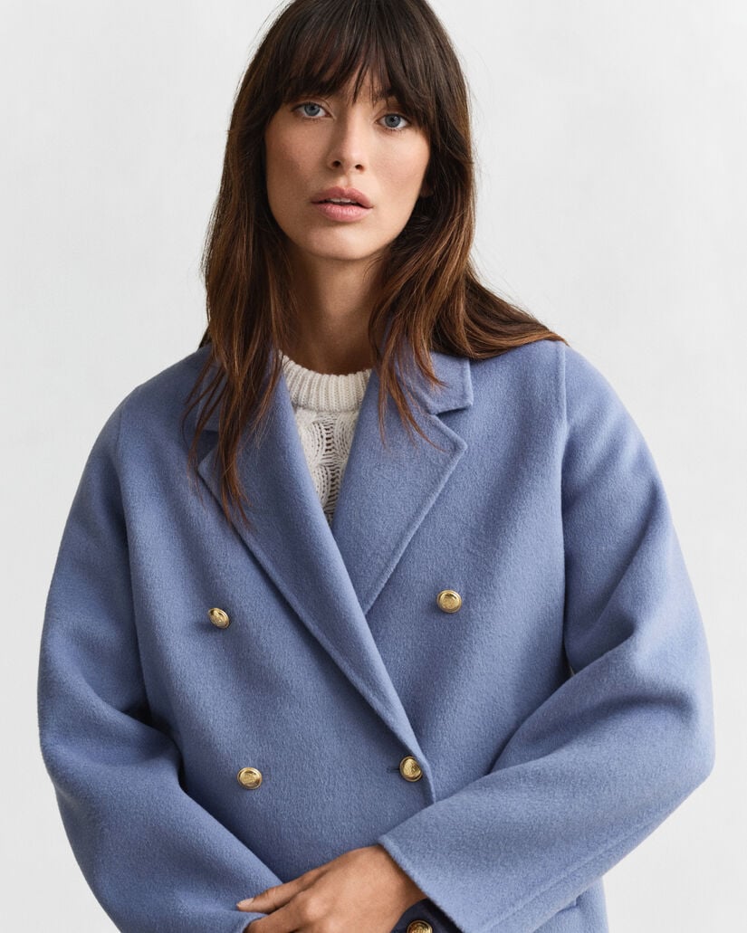 Käsin tikattu kansitakki