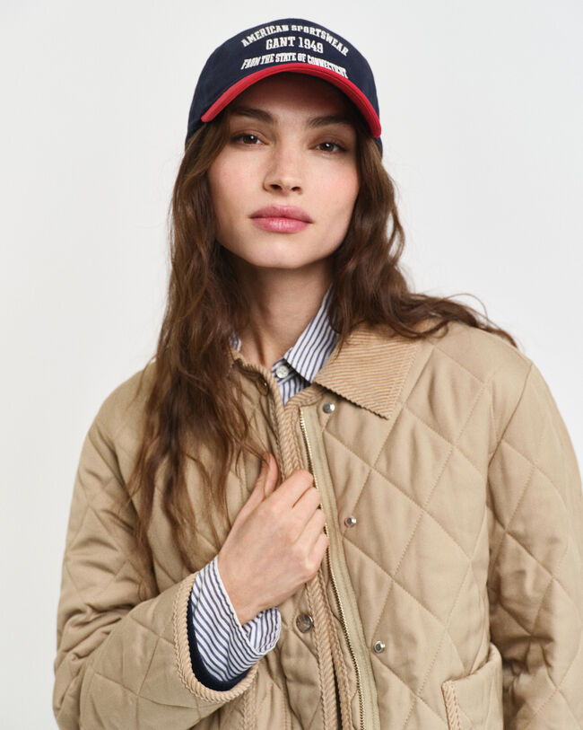 Vakosamettisomisteinen tikkitakki