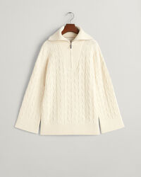 Kalanruotokuvioinen neulepusero, jossa vetoketjullinen pääntie