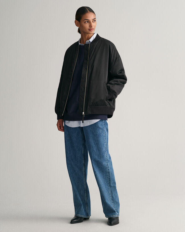 Oversized fit ‑mitoitettu pyöreäpäänteinen G‑collegepaita