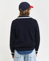 Kontrastivärinen v‑neulepusero erittäin hienoa lampaanvillaa