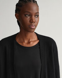 Pitkä villaneuletakki