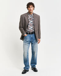 Relaxed fit ‑mitoitettu tilkkutyylinen paita ylijäämäkankaista