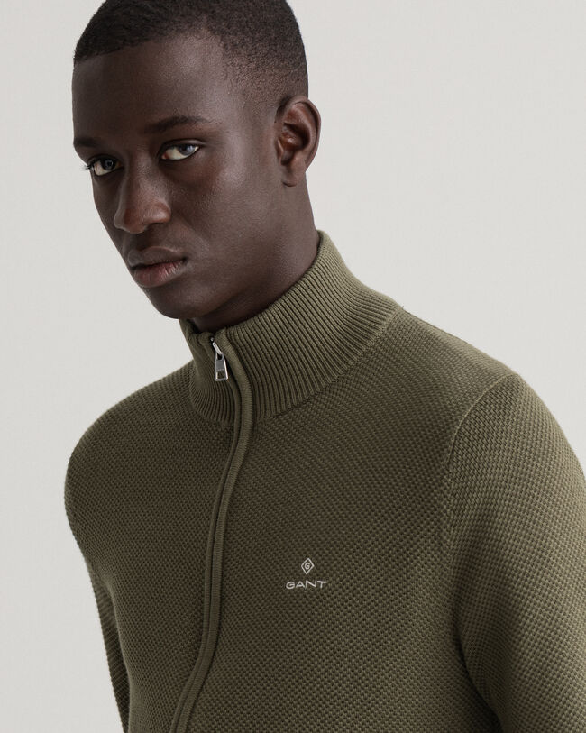 Puuvillainen pikeeneuletakki puolivetoketjulla