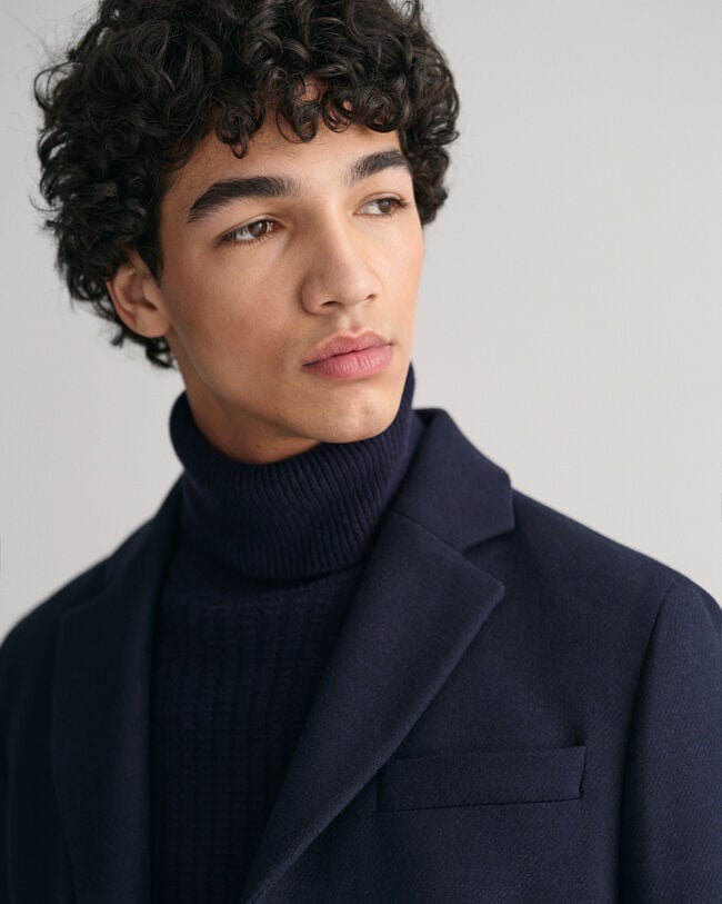 Hyvin istuva klassinen päällystakki villasta