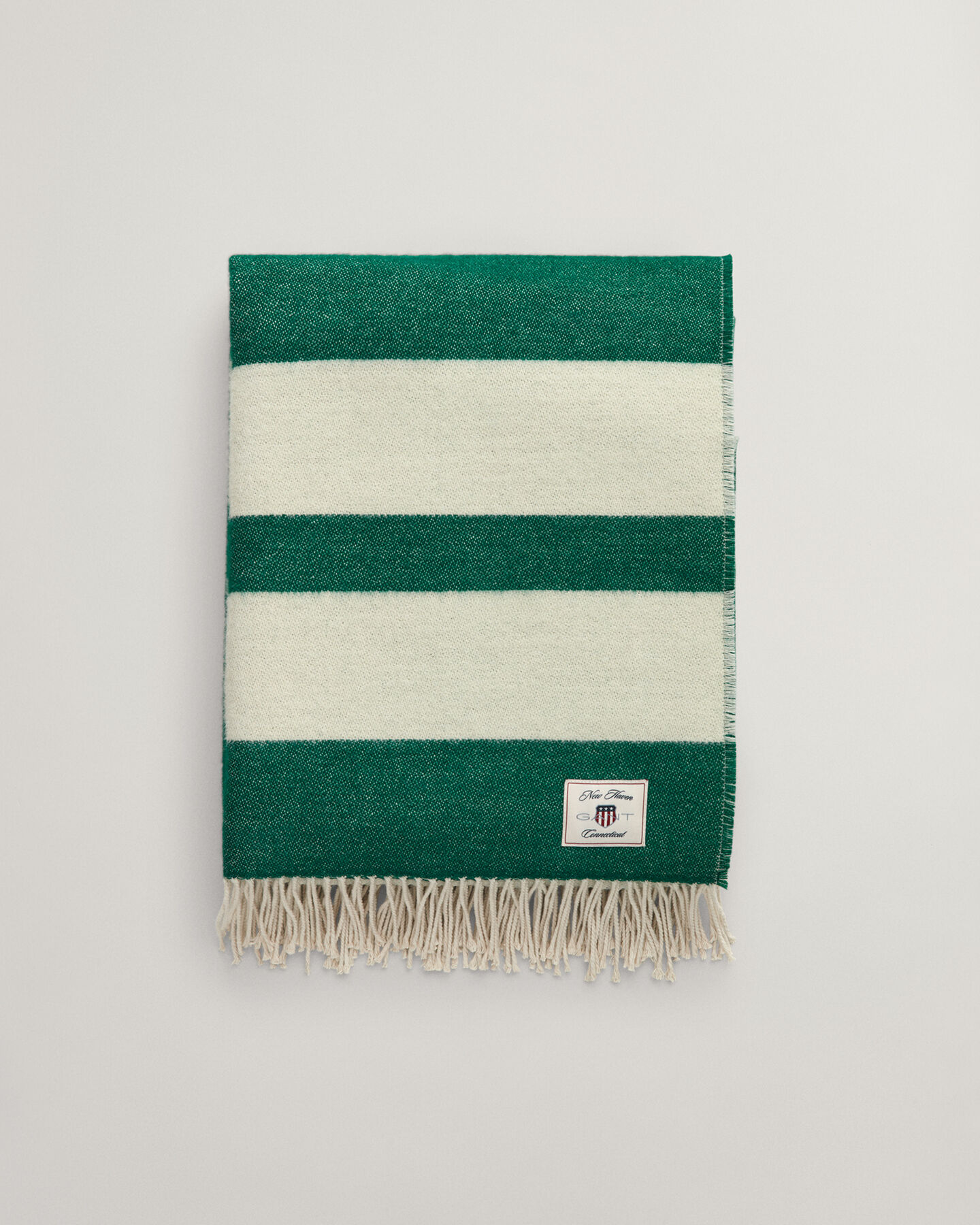 Raidallinen villainen torkkupeitto