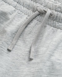 Teens-malliston slubipuuvillaiset Shield-collegeshortsit