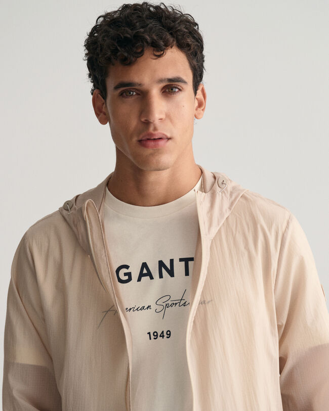 Taskuun pakattava kevyt Windbreaker-takki