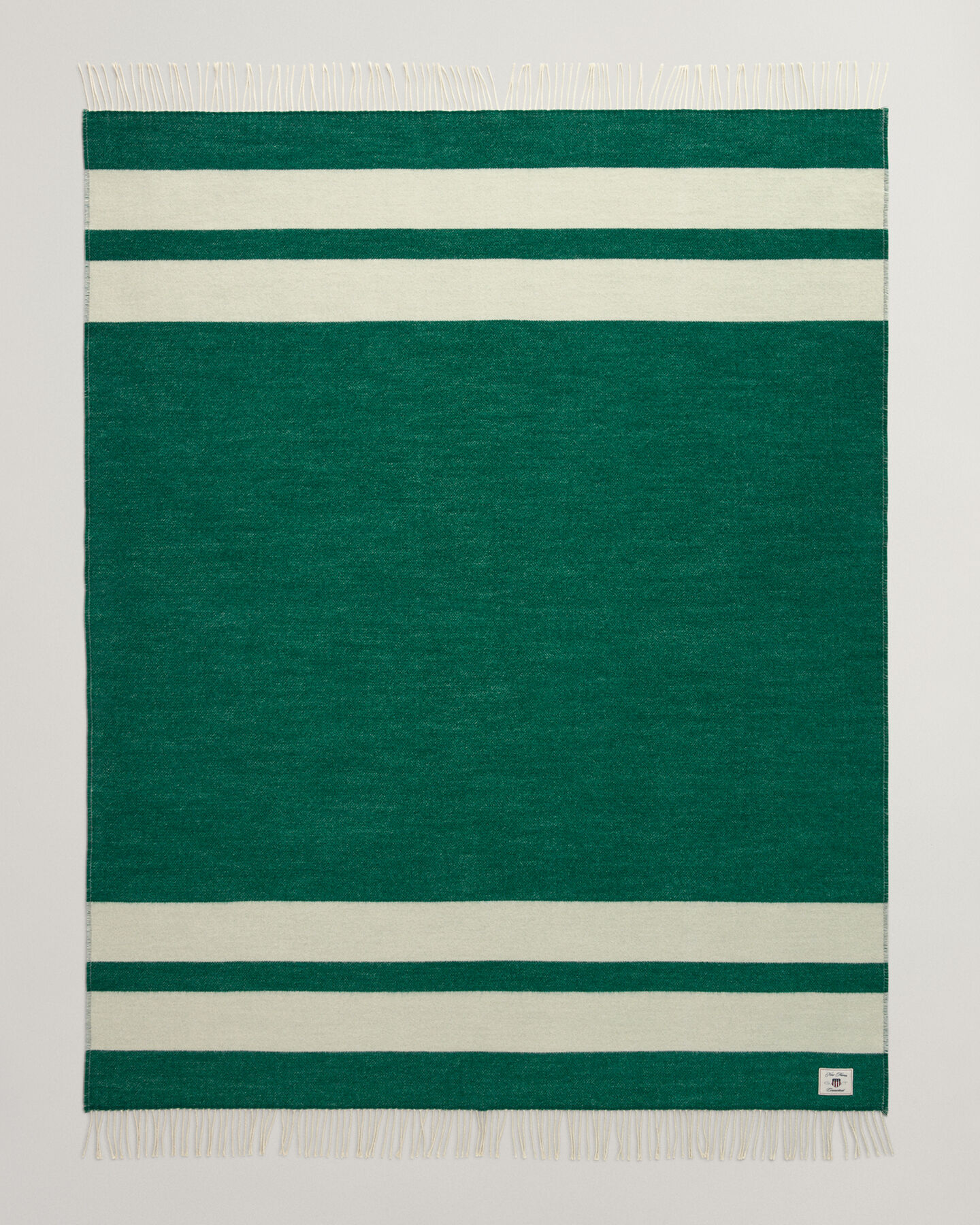 Raidallinen villainen torkkupeitto