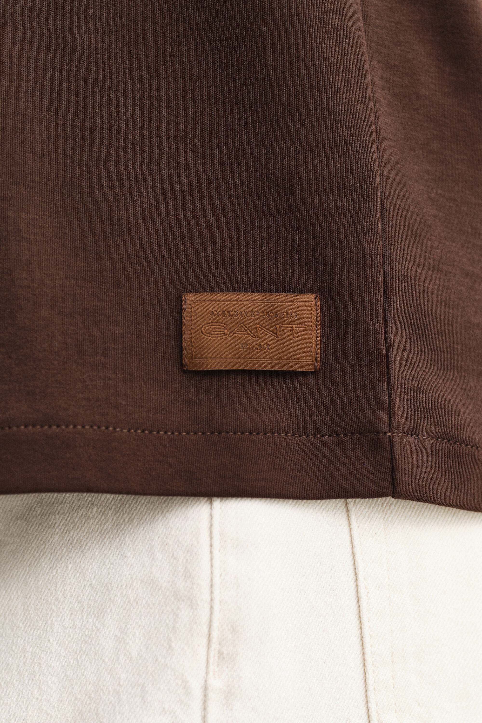 Collegeneulos-t‑paita