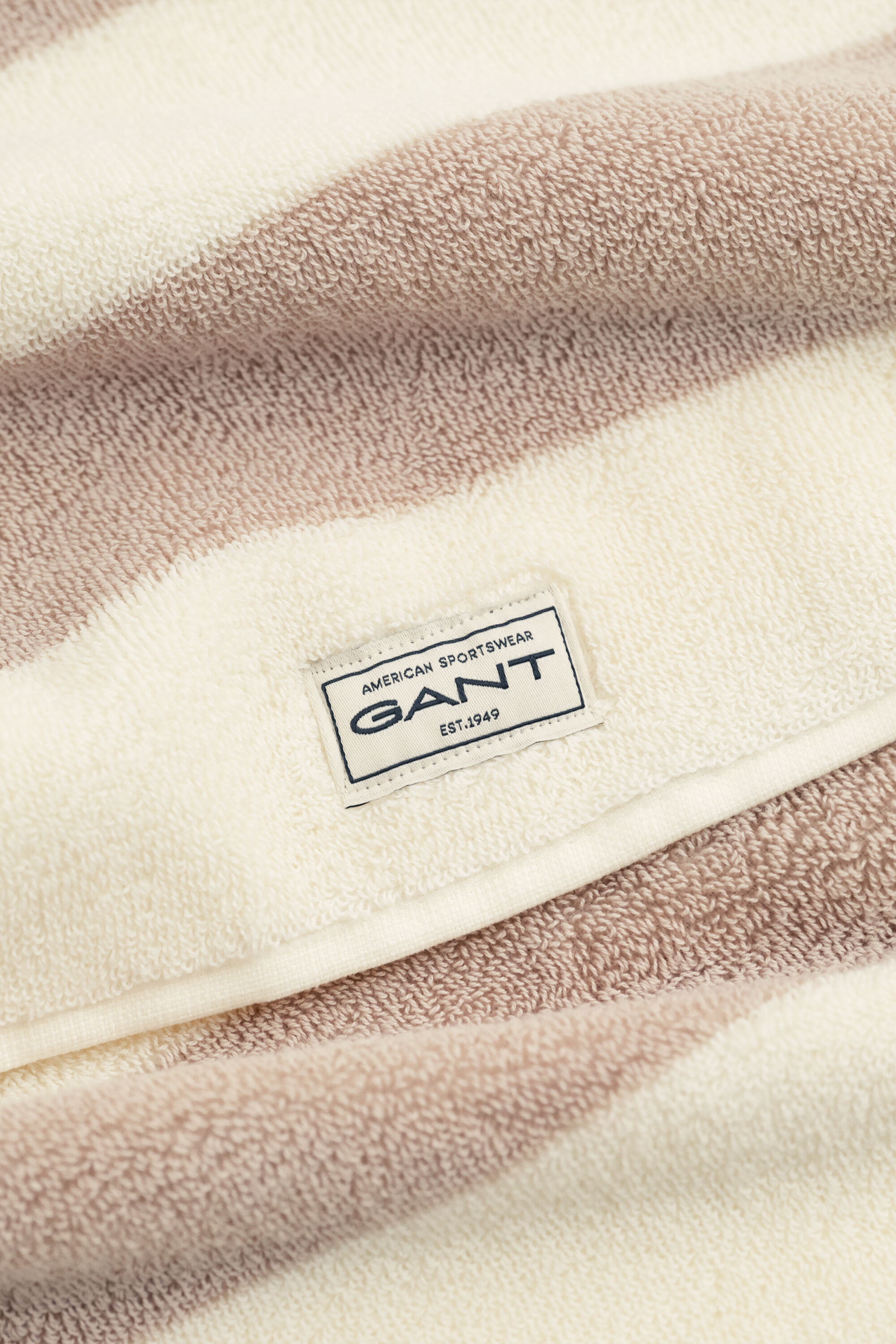 Raidallinen pyyhe (50 cm x 70 cm)