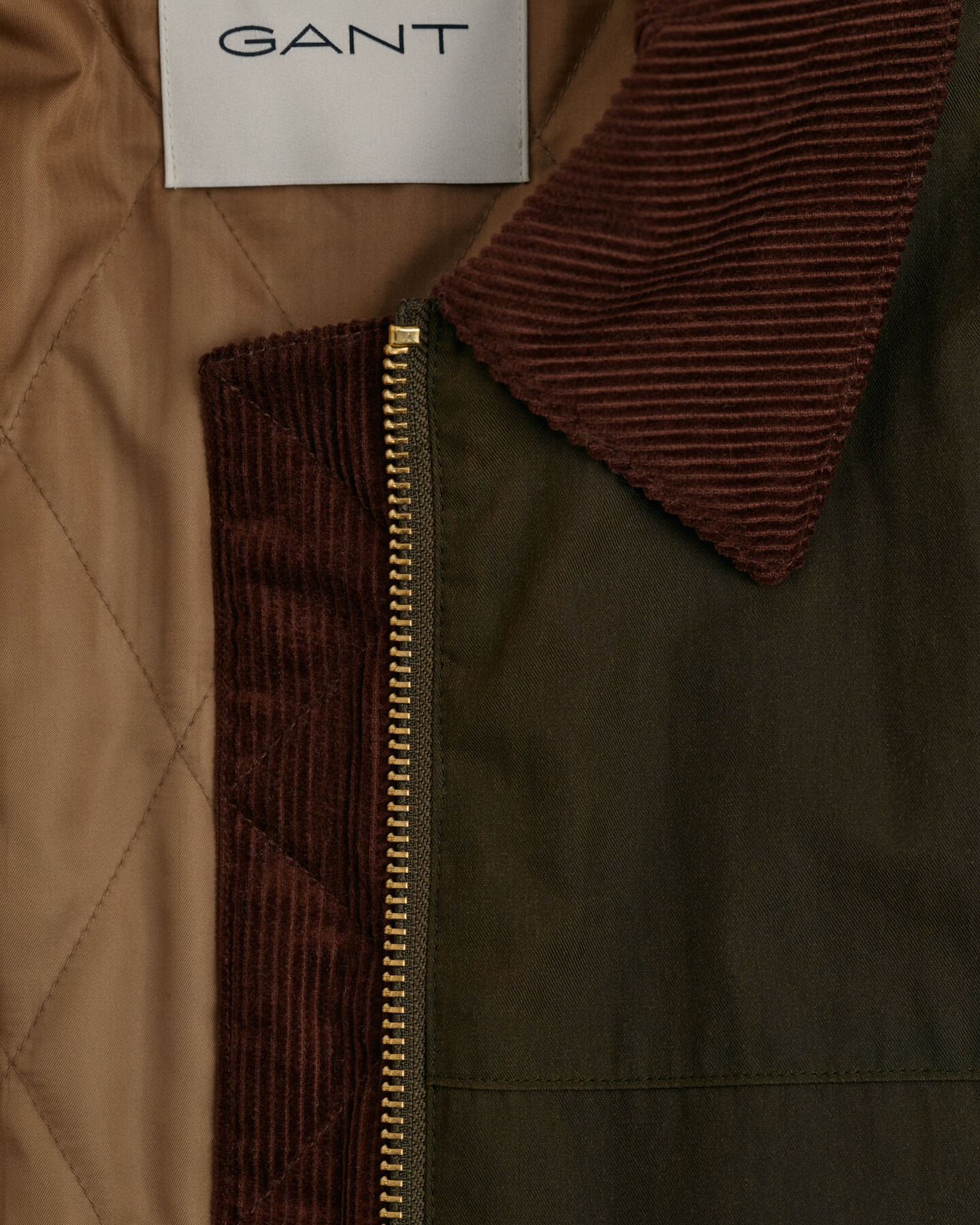 Vahapintainen puolipitkä takki