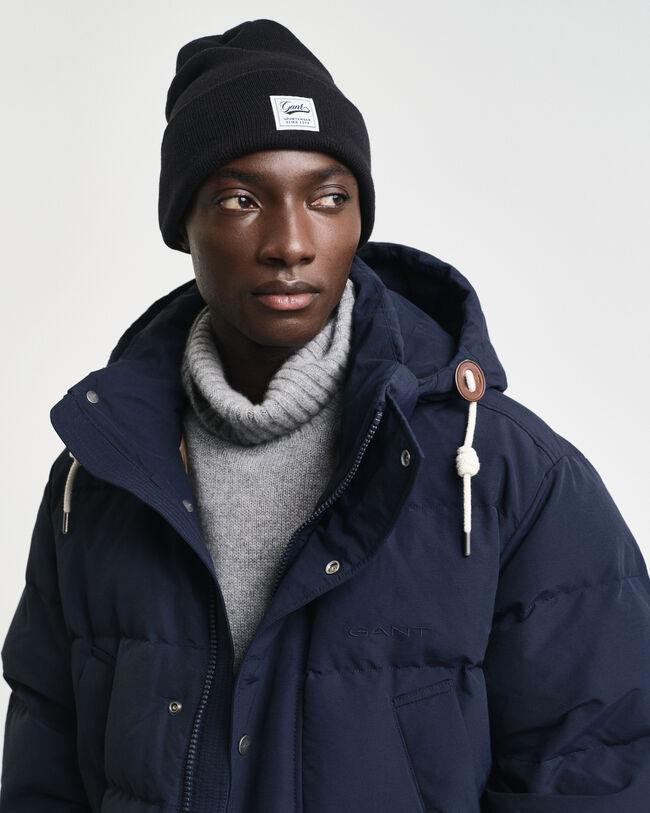 Paksu keskipitkä untuvatakki