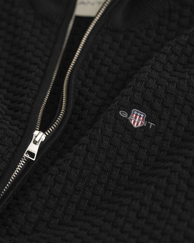 Kohopintainen vetoketjullinen puuvillaneuletakki