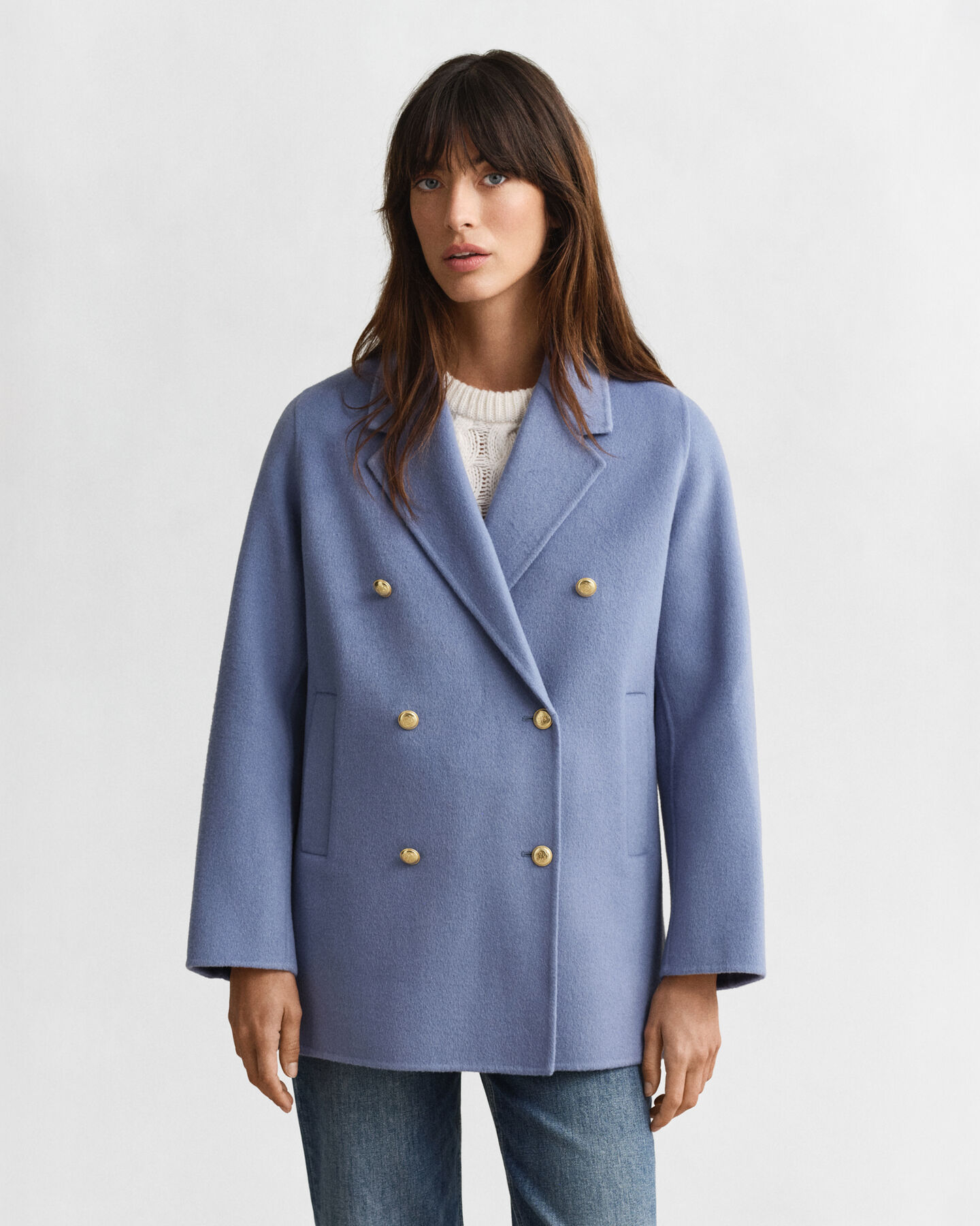 Käsin tikattu kansitakki