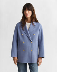 Käsin tikattu kansitakki