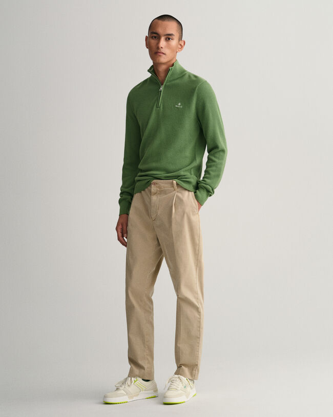 Puuvillapikeekankaasta tehty neulepusero puolivetoketjulla