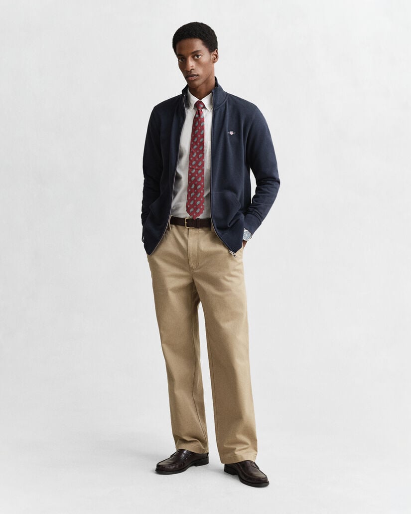 Vetoketjullinen Shield‑collegepaita