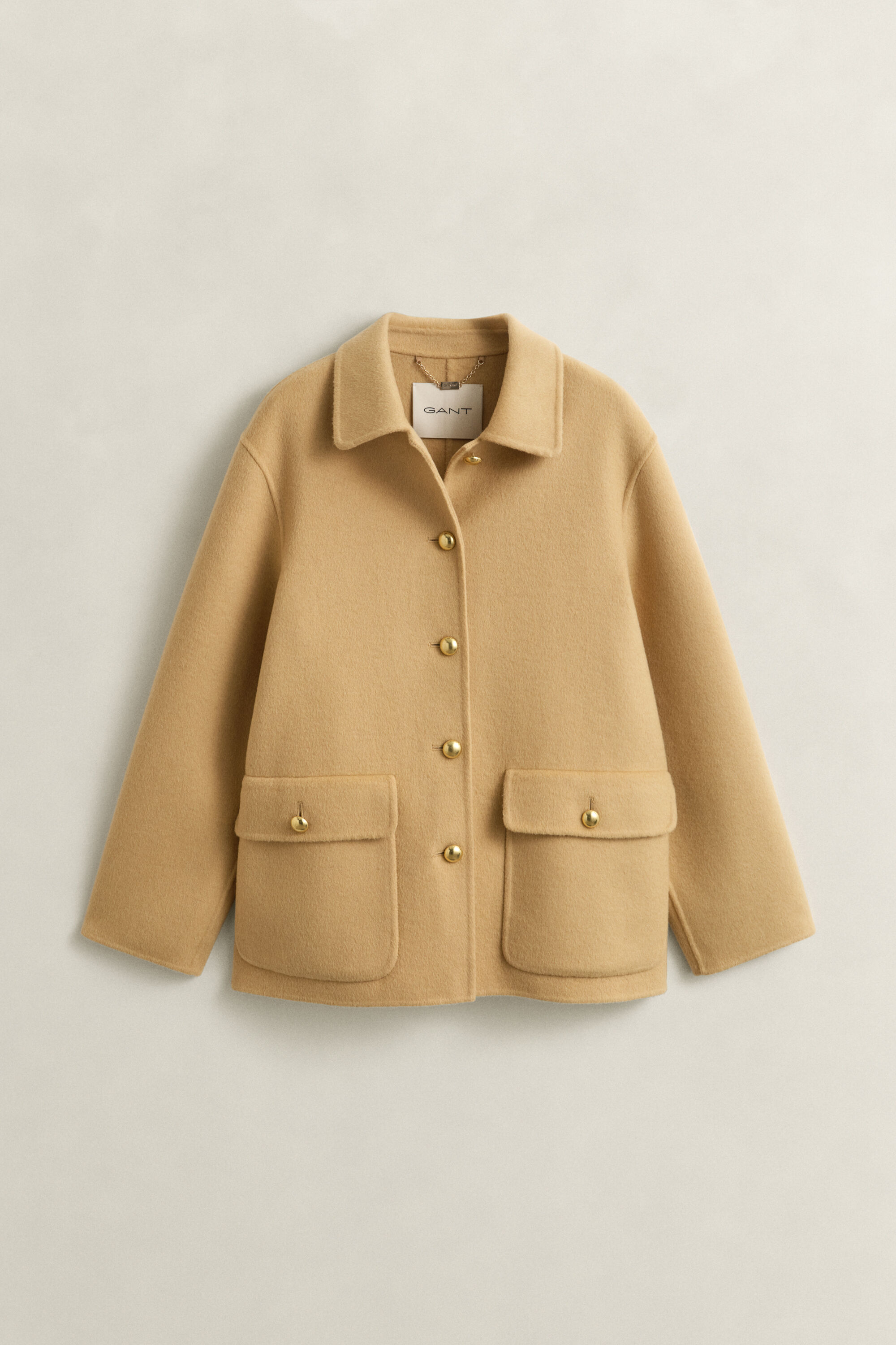 Käsin tikattu takki