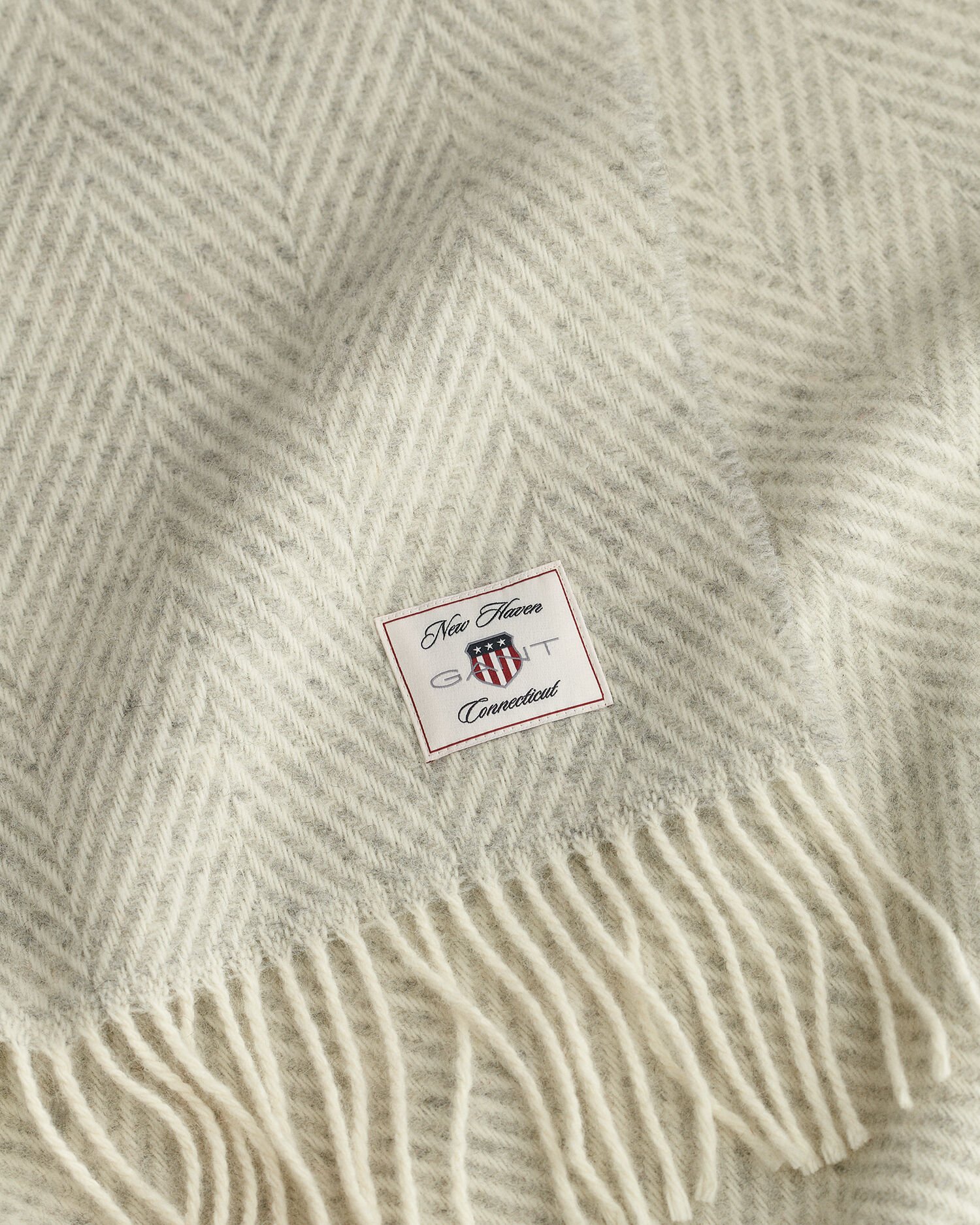 Kalanruotokuvioinen villainen torkkupeitto