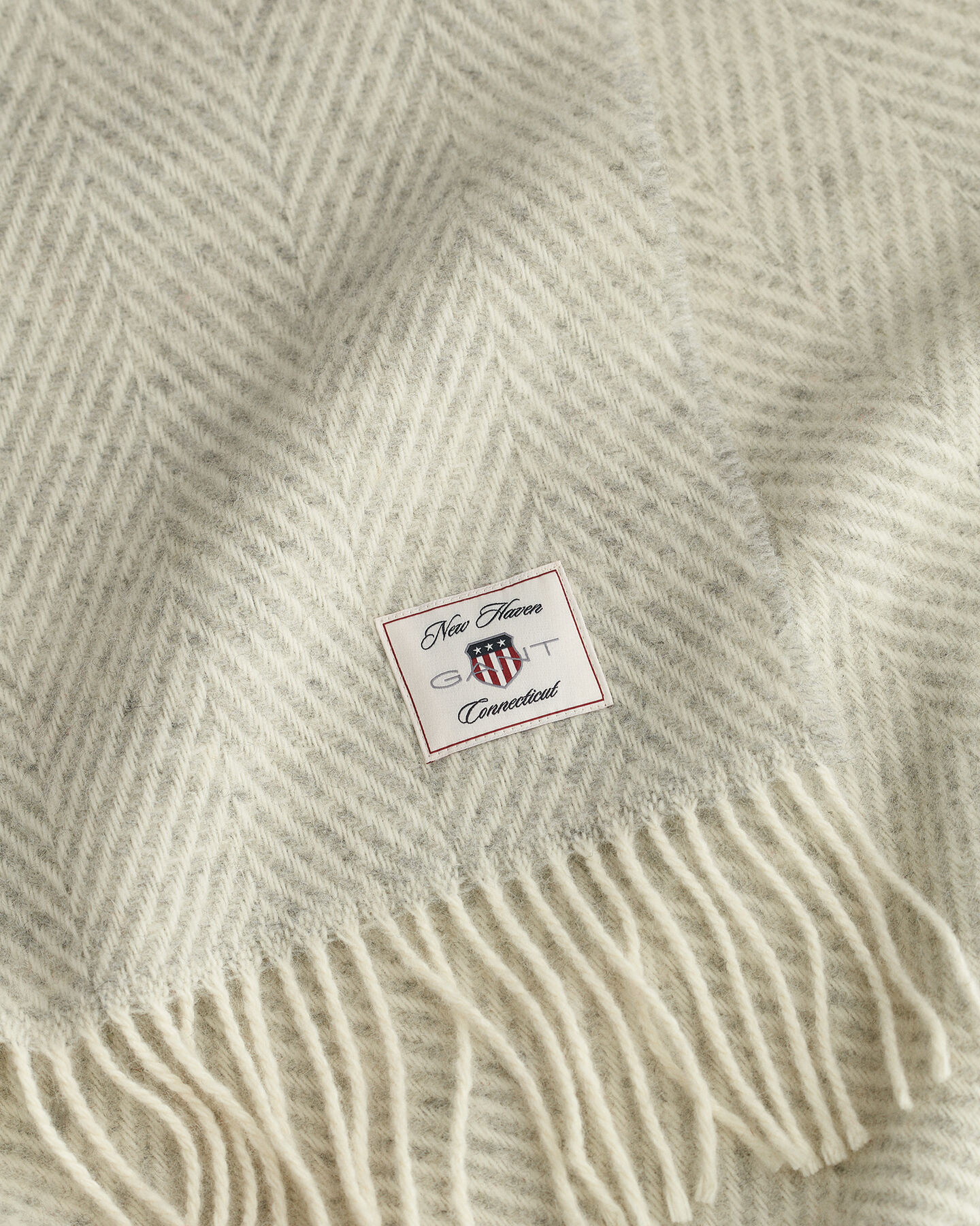 Kalanruotokuvioinen villainen torkkupeitto