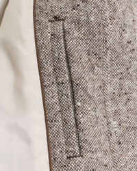 Villakangastakki kontrastivärisellä kauluksella