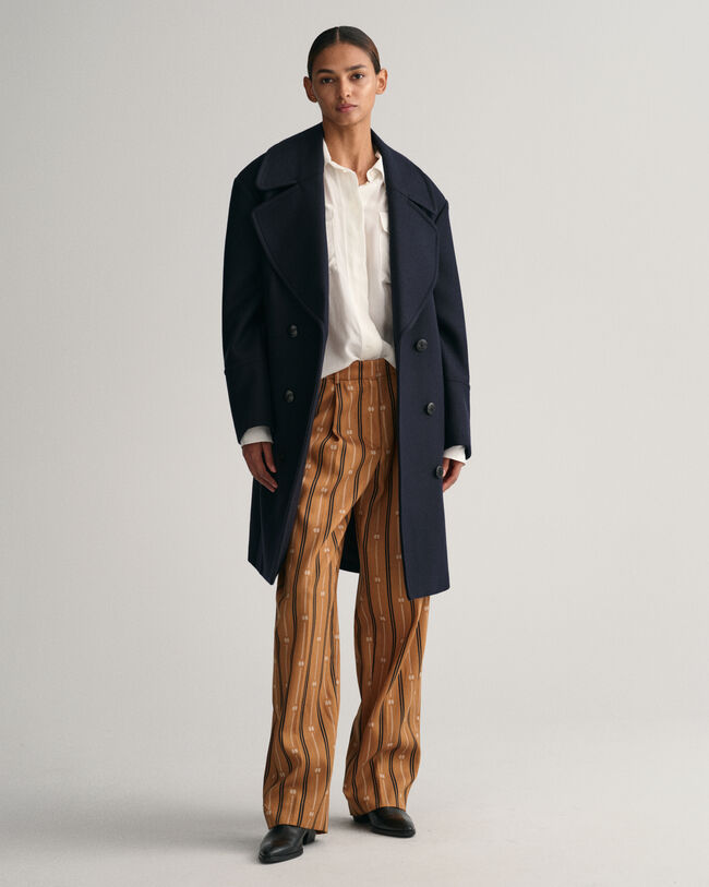 Relaxed fit ‑mitoitetut Monogram-raitahousut