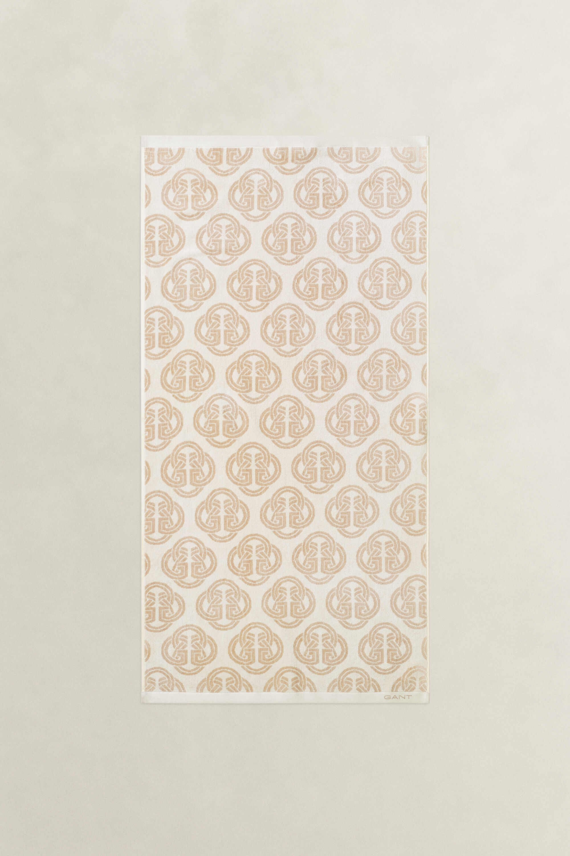 Monogram-pyyhe (70 cm x 140 cm)