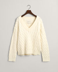 Kohopintainen puuvillaneulepusero, jossa v-p&auml;&auml;ntie