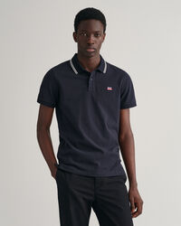 Pikeepaita, jossa raidallinen kaulus