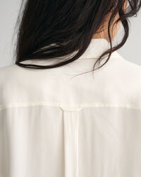 Relaxed fit ‑mitoitettu taskullinen paita