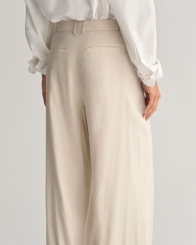 Relaxed fit ‑mitoitetut huolitellut joustopellavahousut