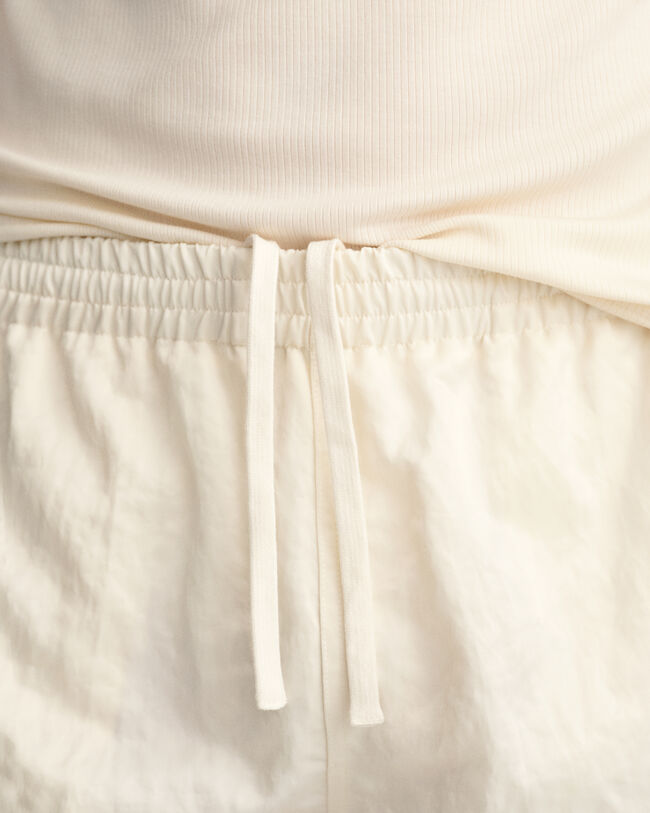 Satiiniset juoksushortsit