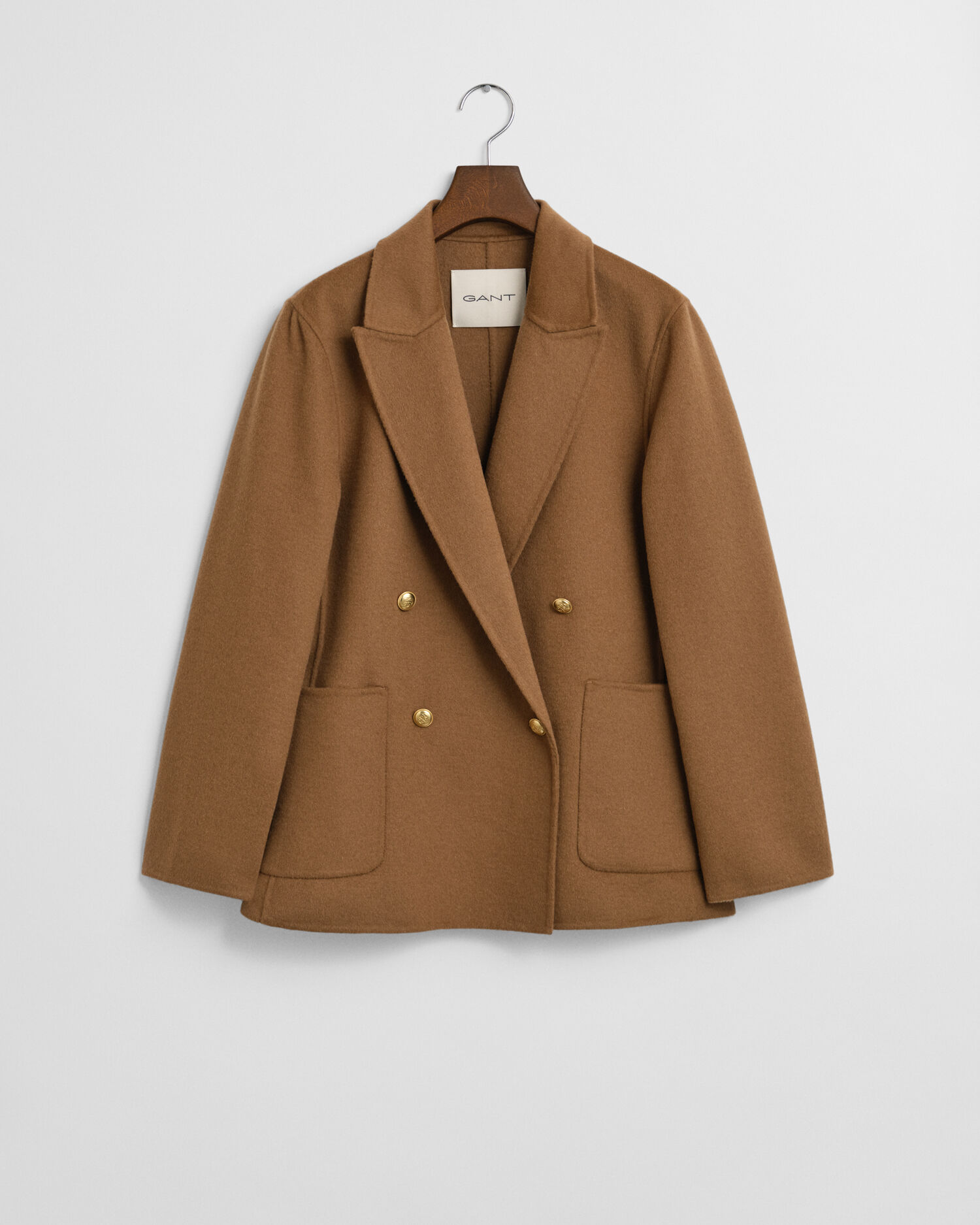 Käsin tikattu klubitakki