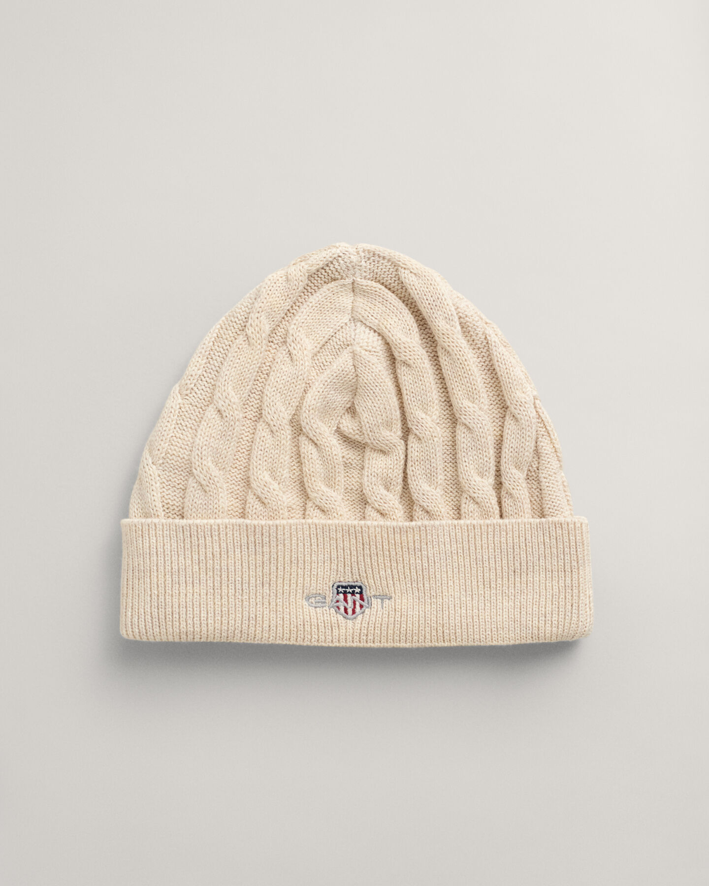 Baby-malliston puuvillainen Shield-palmikkoneulepipo