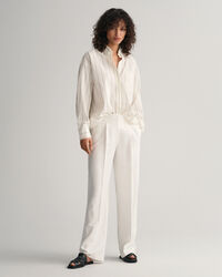 Relaxed fit ‑mitoitetut laskoshousut