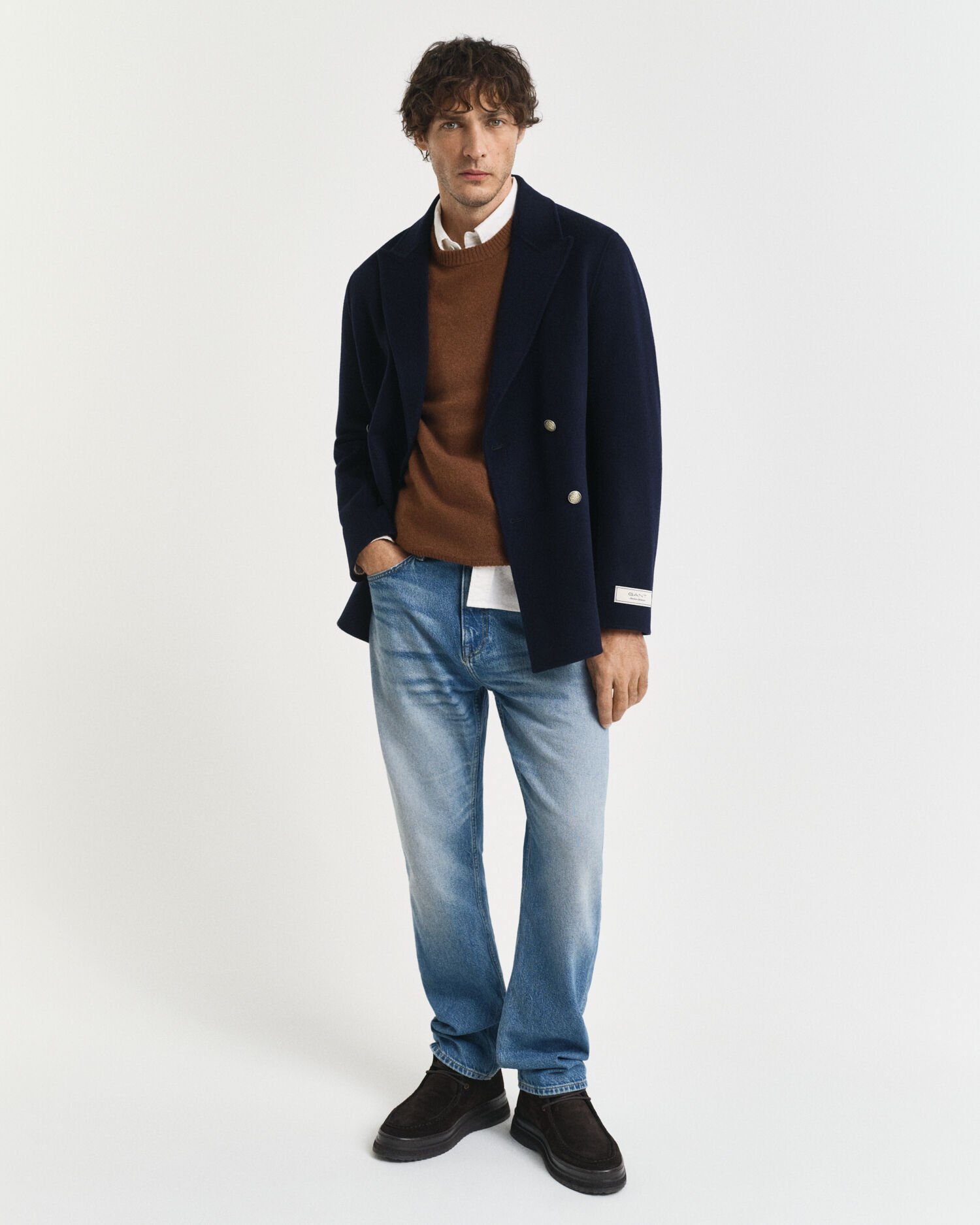 Käsin tikattu klubitakki