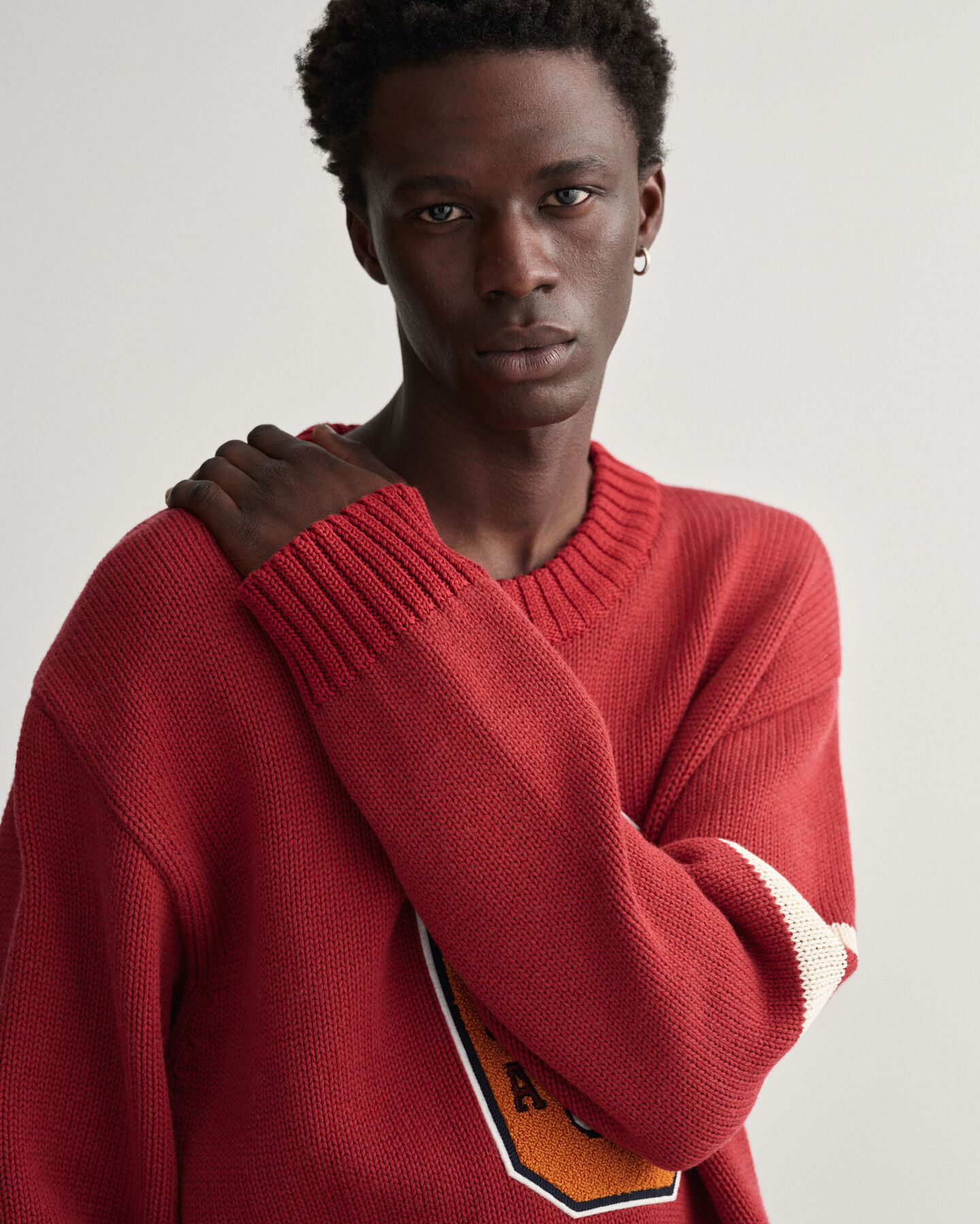 Oversized fit ‑mitoitettu Letterman-neulepusero, py&ouml;re&auml; p&auml;&auml;ntie